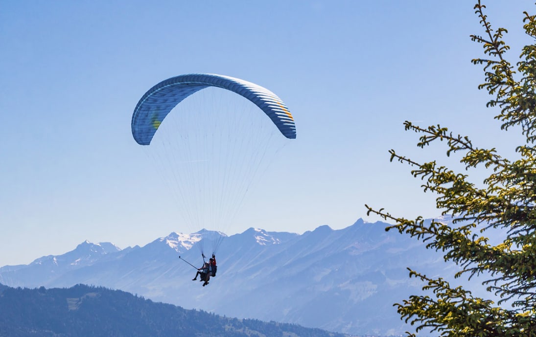 Paragliding above the Swiss Alps