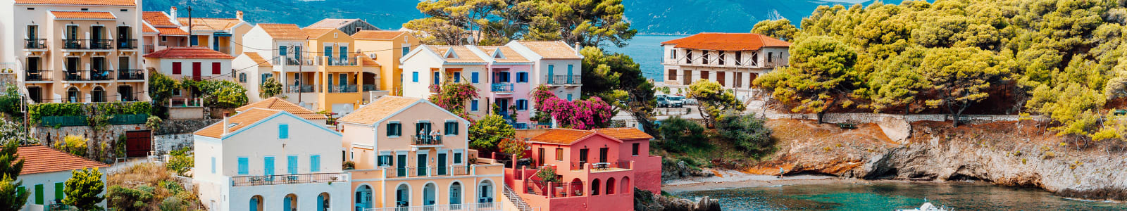 Serene bay in Kefalonia with bright buildings