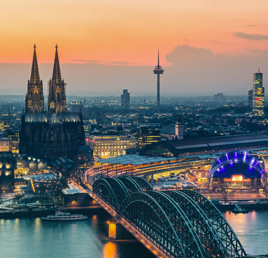 Waterside Cologne skyline at dusk