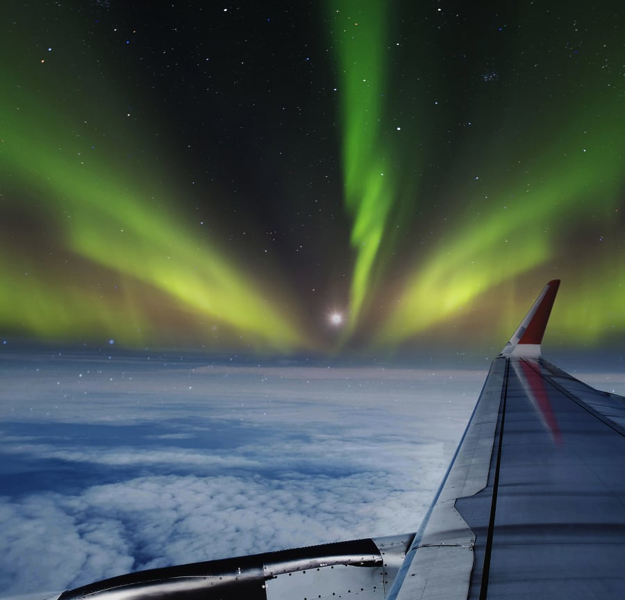 The Northern Lights from a plane window